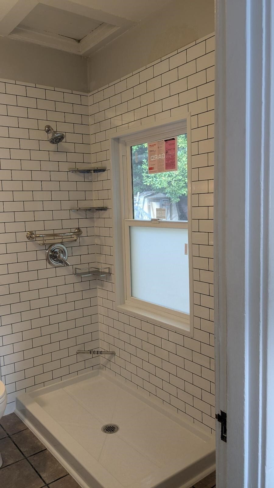 after-photo-of-a-white-subway-tile-shower-conversion-install-e8207d12