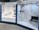 Bathroom showroom display with white subway tile and marble-look tub surrounds