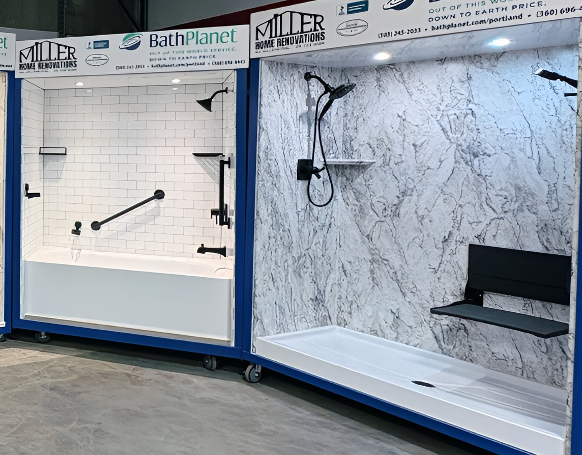 Bathroom showroom display with white subway tile and marble-look tub surrounds