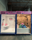 Showroom display featuring marble-look bath wall surrounds and bathroom fixtures